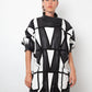 Yves Saint Laurent 80's black and white leather harlequin coat