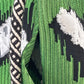 Jean-Paul Lespagnard green, white and black graphic "wheel traces" jacquard waist coat