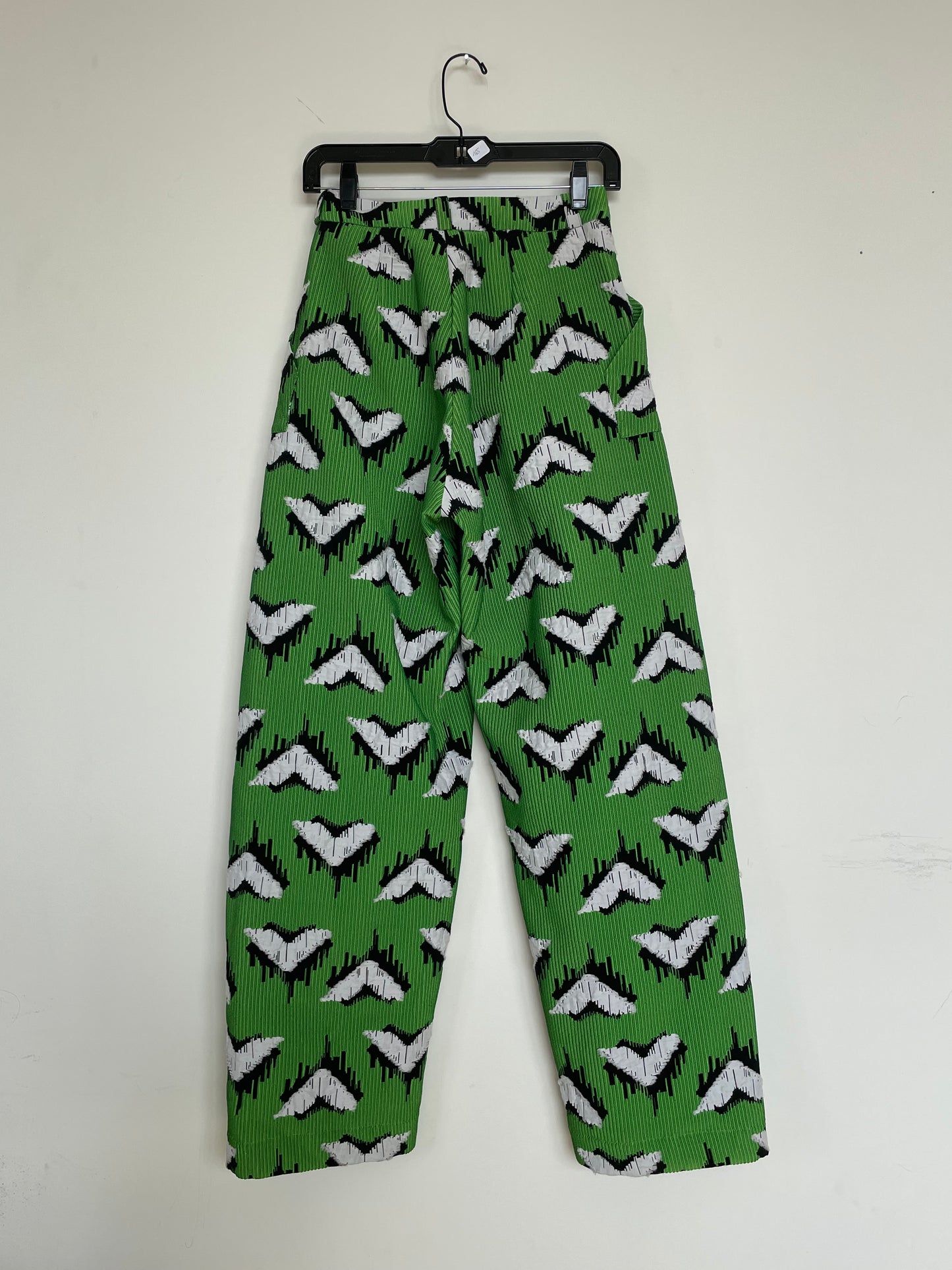 Jean-Paul Lespagnard pleated green, black and white jacquard trousers with "traces of wheels" pattern