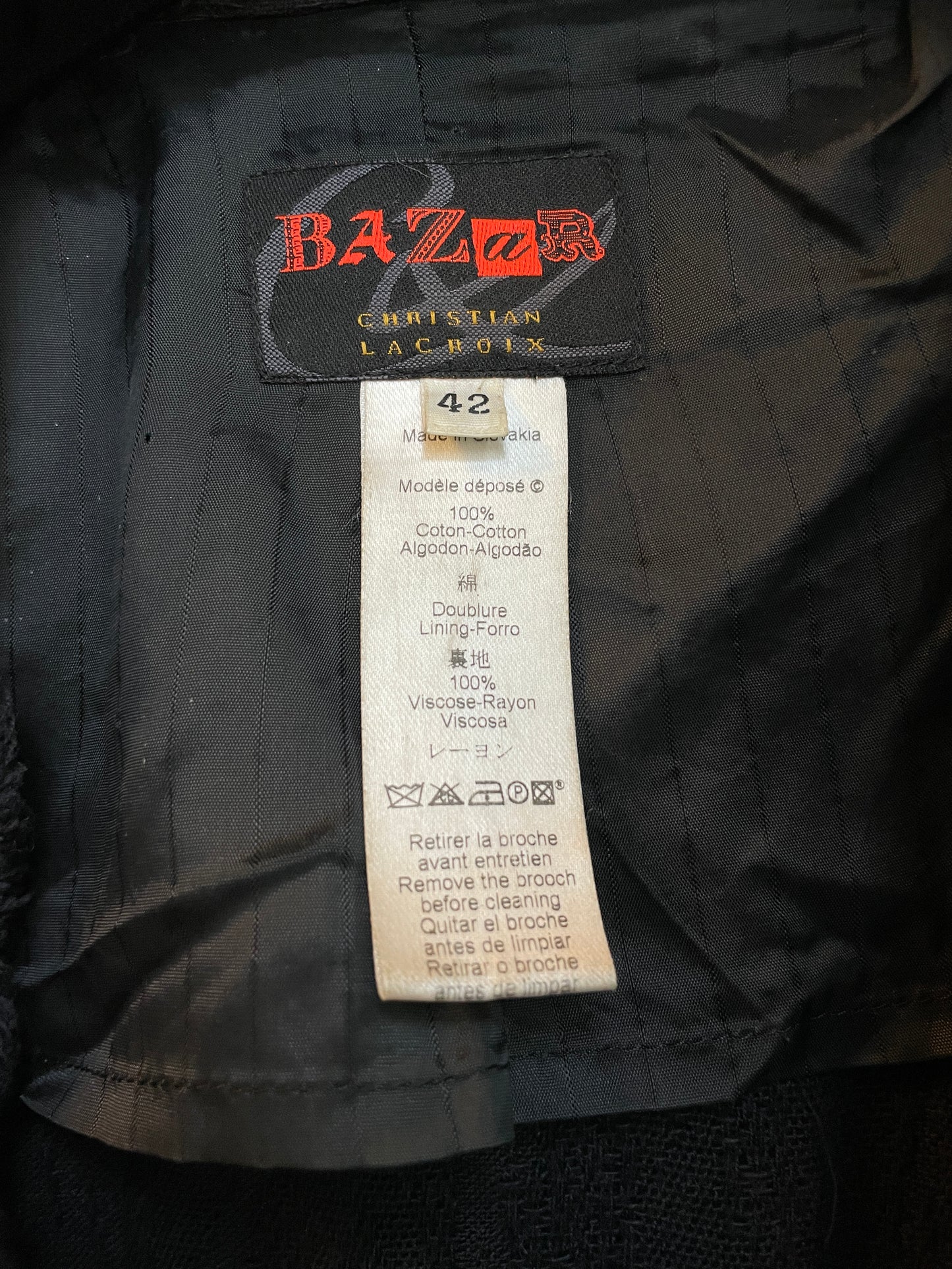 Christian Lacroix Bazar 90's distressed black knit jacket with brooch detail
