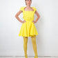 Versace FW 2021 full runway look 36 : yellow dress , Medusa Aevitas heels and stockings