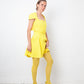Versace FW 2021 full runway look 36 : yellow dress , Medusa Aevitas heels and stockings