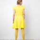 Versace FW 2021 full runway look 36 : yellow dress , Medusa Aevitas heels and stockings
