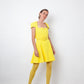 Versace FW 2021 full runway look 36 : yellow dress , Medusa Aevitas heels and stockings