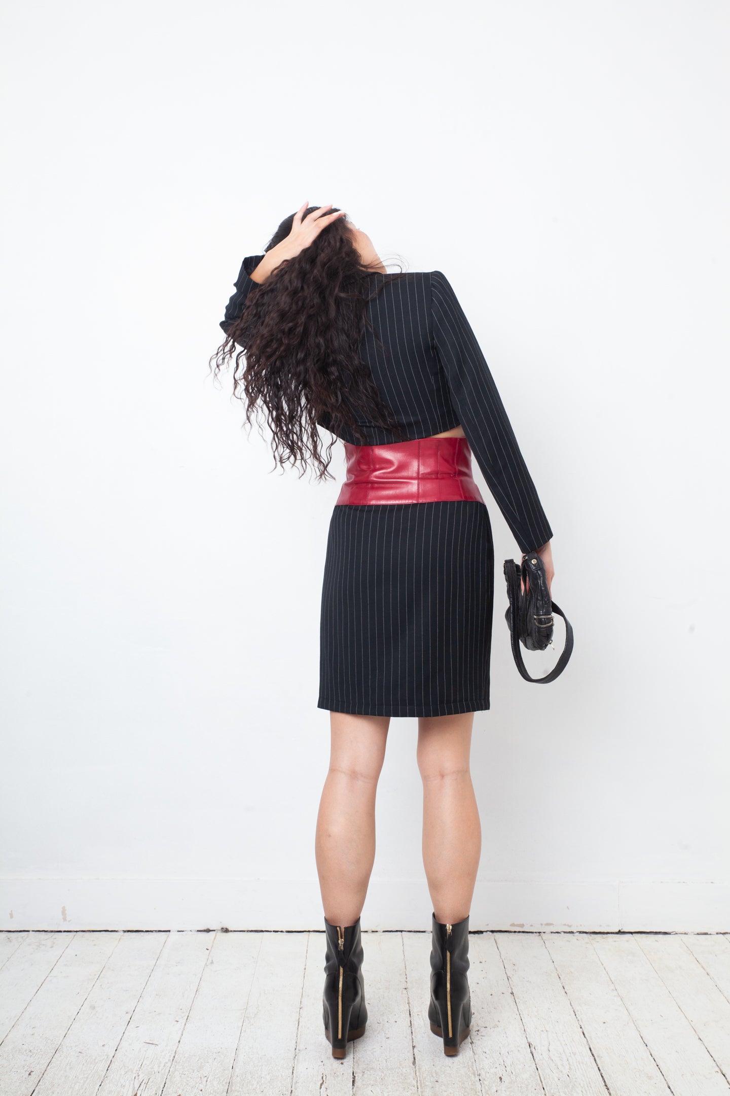 Angelo Tarlazzi 90's pinstripe black skirt suit with red leather waistband