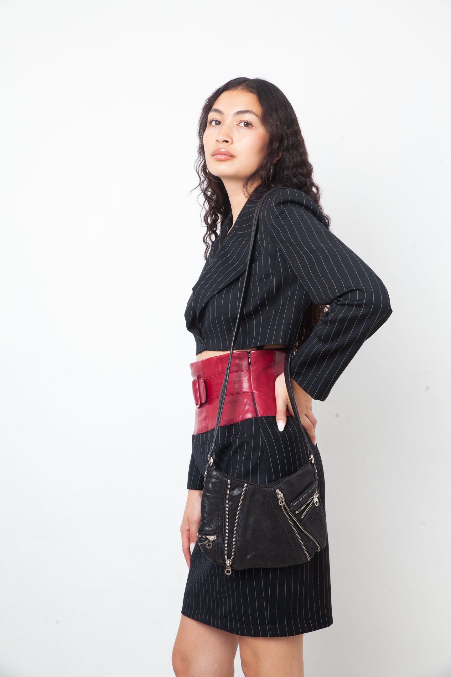 Angelo Tarlazzi 90's pinstripe black skirt suit with red leather waistband