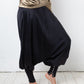 Balmain 2010's silk black sarwell trousers with diamond button detail