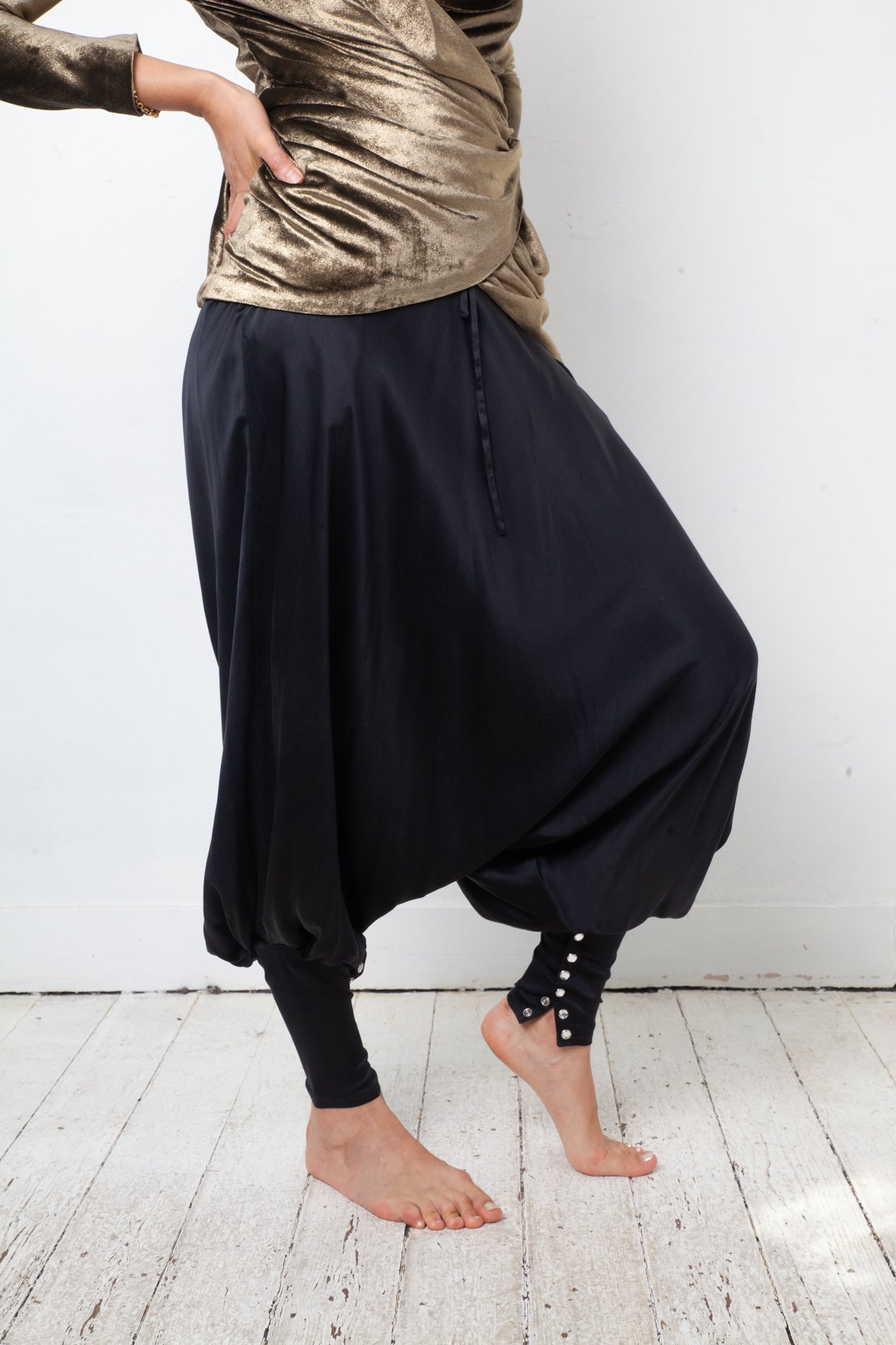 Balmain 2010's silk black sarwell trousers with diamond button detail
