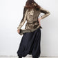 Balmain 2010's silk black sarwell trousers with diamond button detail