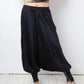 Balmain 2010's silk black sarwell trousers with diamond button detail