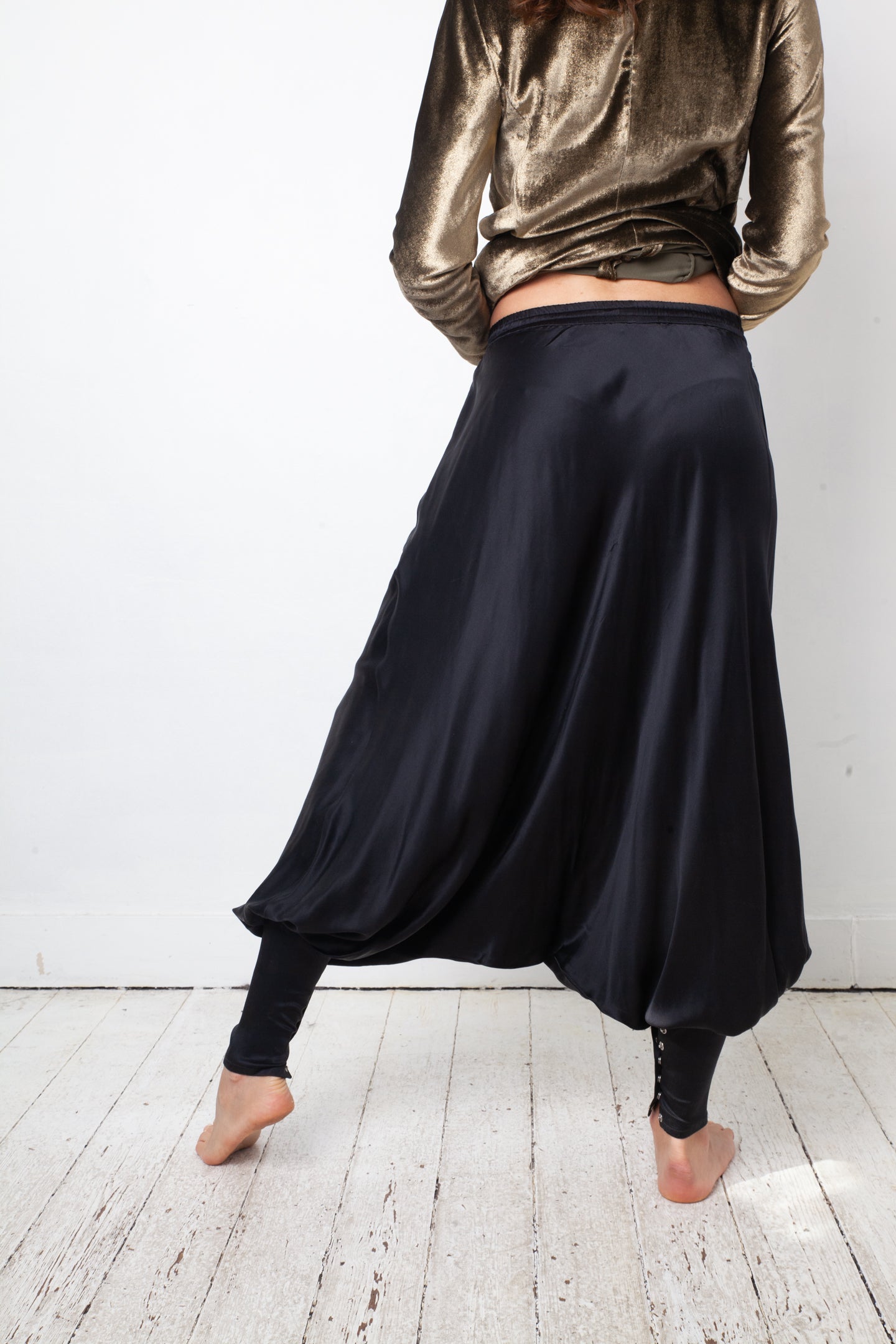 Balmain 2010's silk black sarwell trousers with diamond button detail