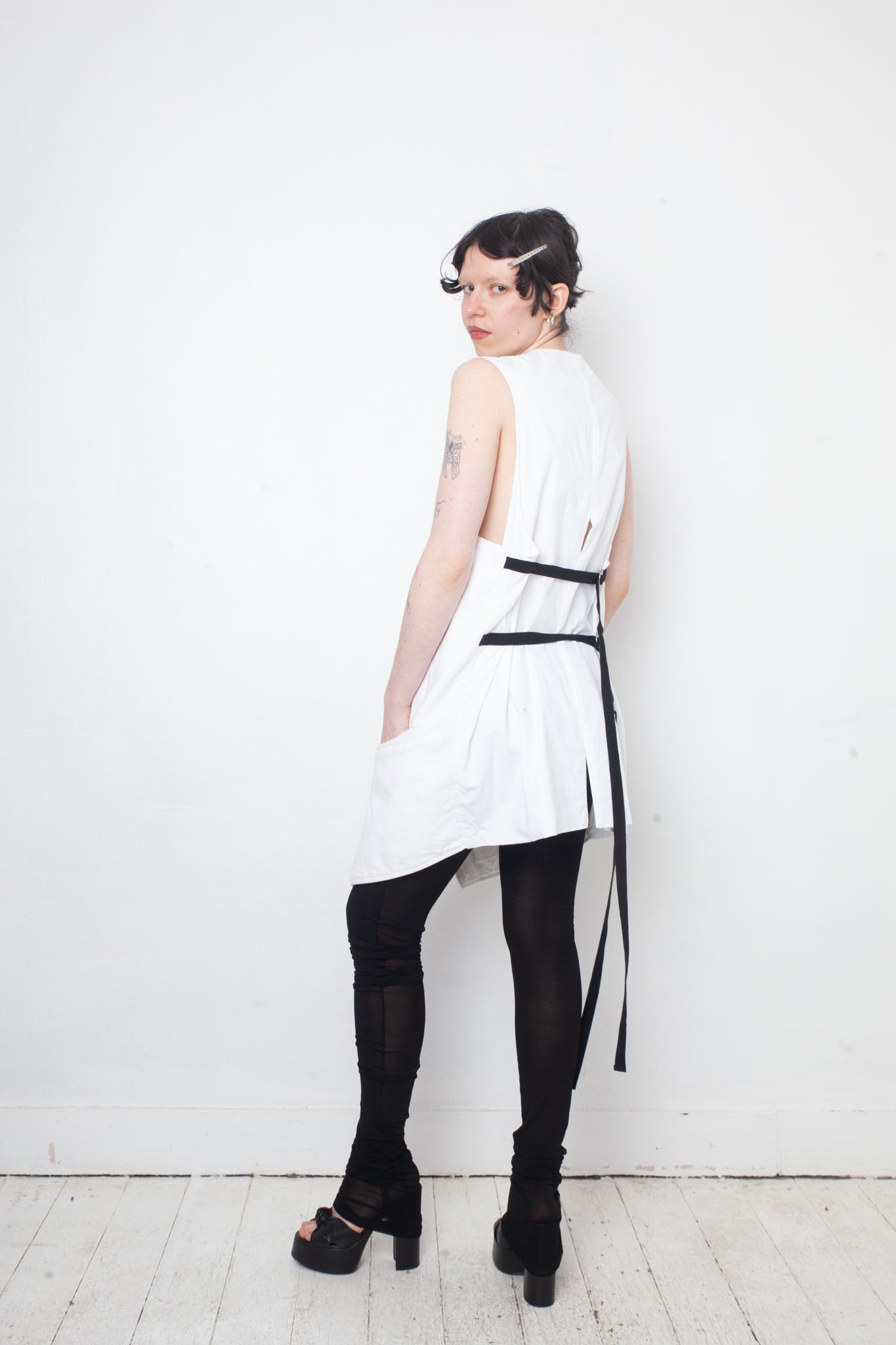 Ann Demeulemeester SS 2022 white denim oversized gilet with back slit and belts