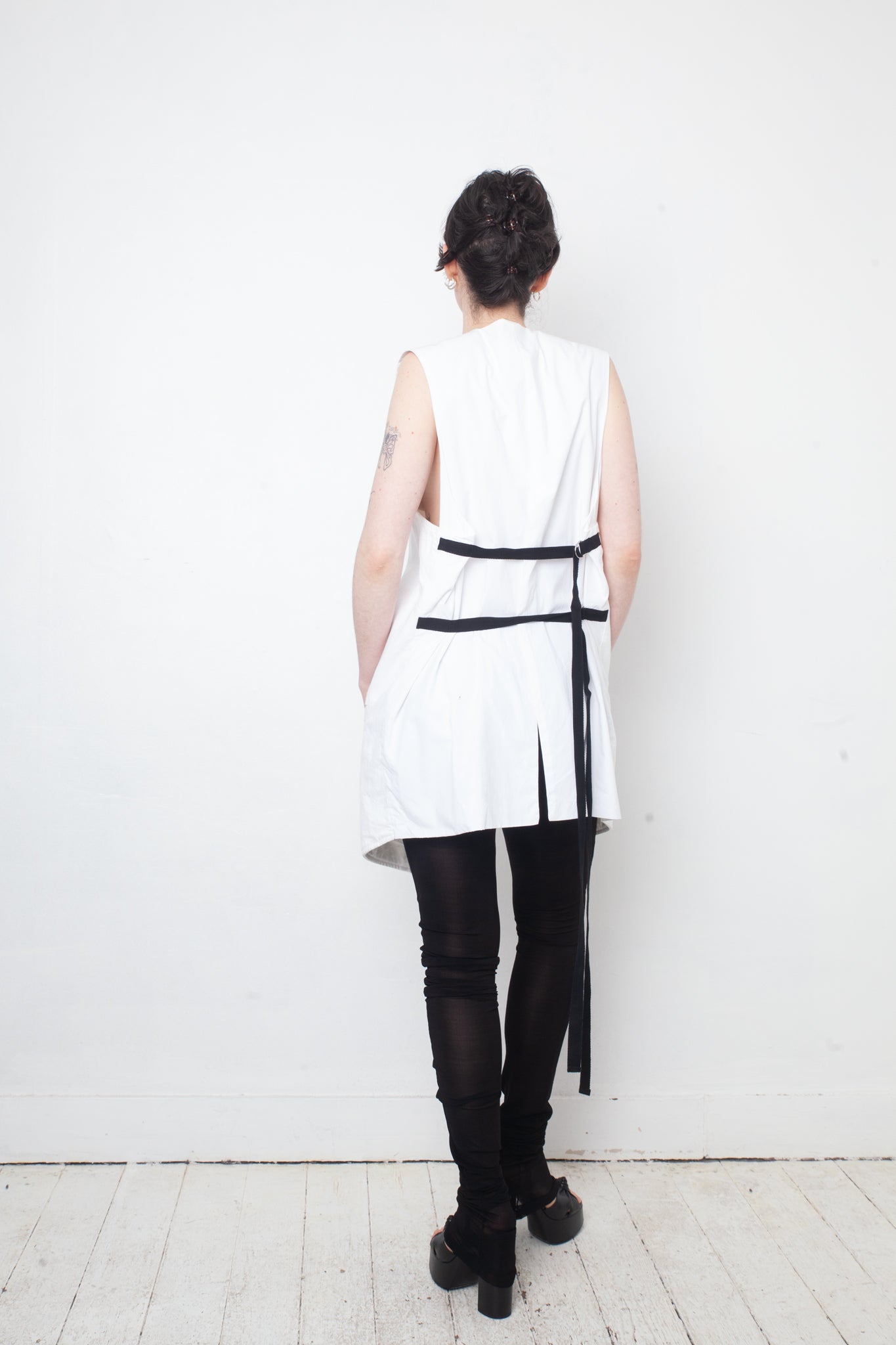 Ann Demeulemeester SS 2022 white denim oversized gilet with back slit and belts