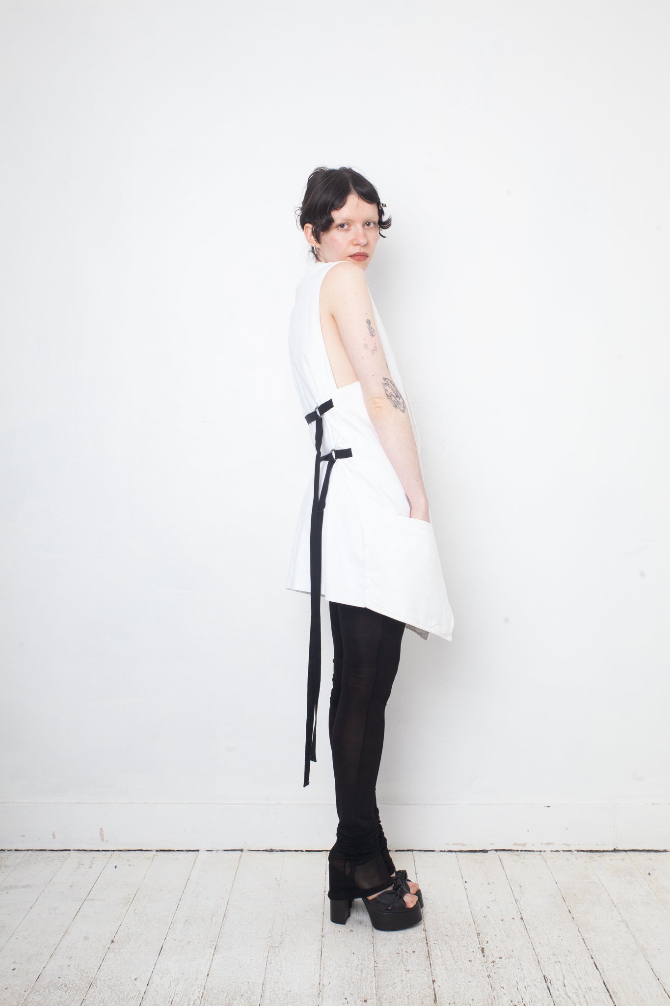 Ann Demeulemeester SS 2022 white denim oversized gilet with back slit and belts