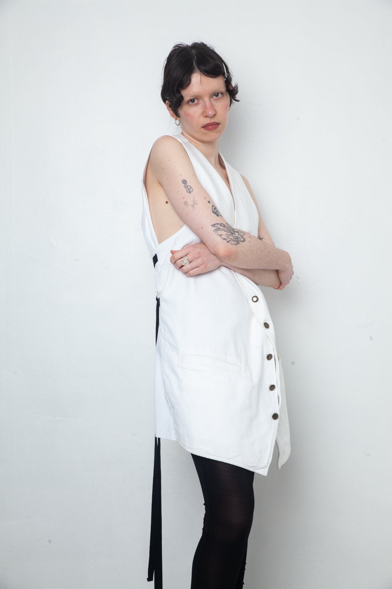 Ann Demeulemeester SS 2022 white denim oversized gilet with back slit and belts