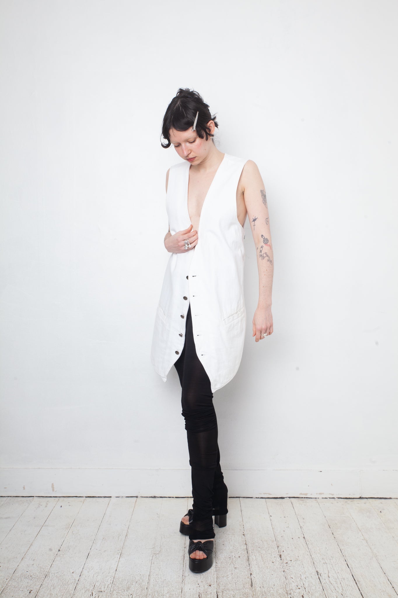 Ann Demeulemeester SS 2022 white denim oversized gilet with back slit and belts