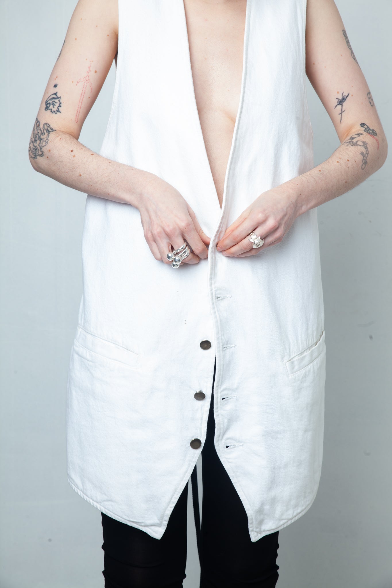 Ann Demeulemeester SS 2022 white denim oversized gilet with back slit and belts