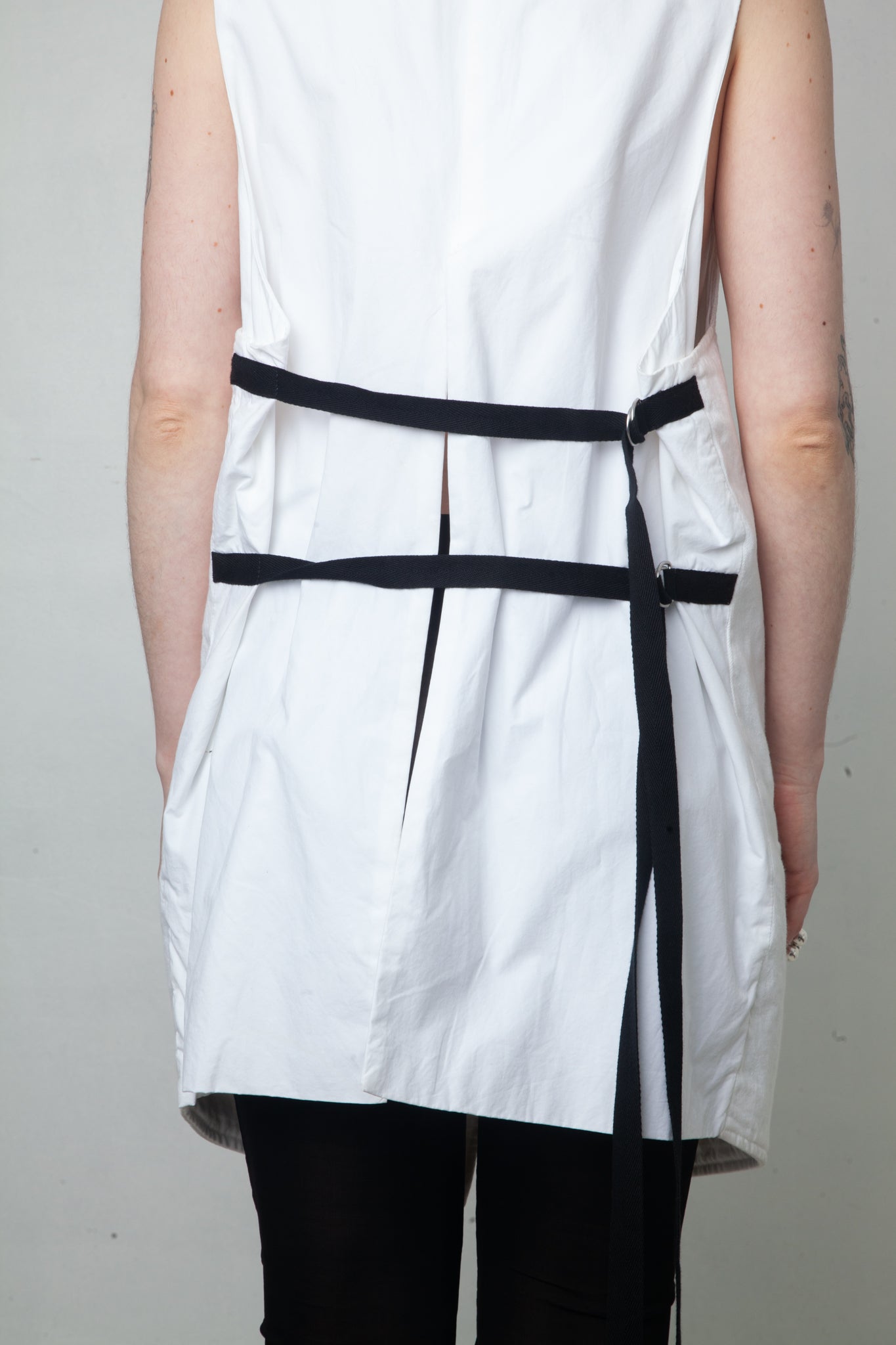 Ann Demeulemeester SS 2022 white denim oversized gilet with back slit and belts