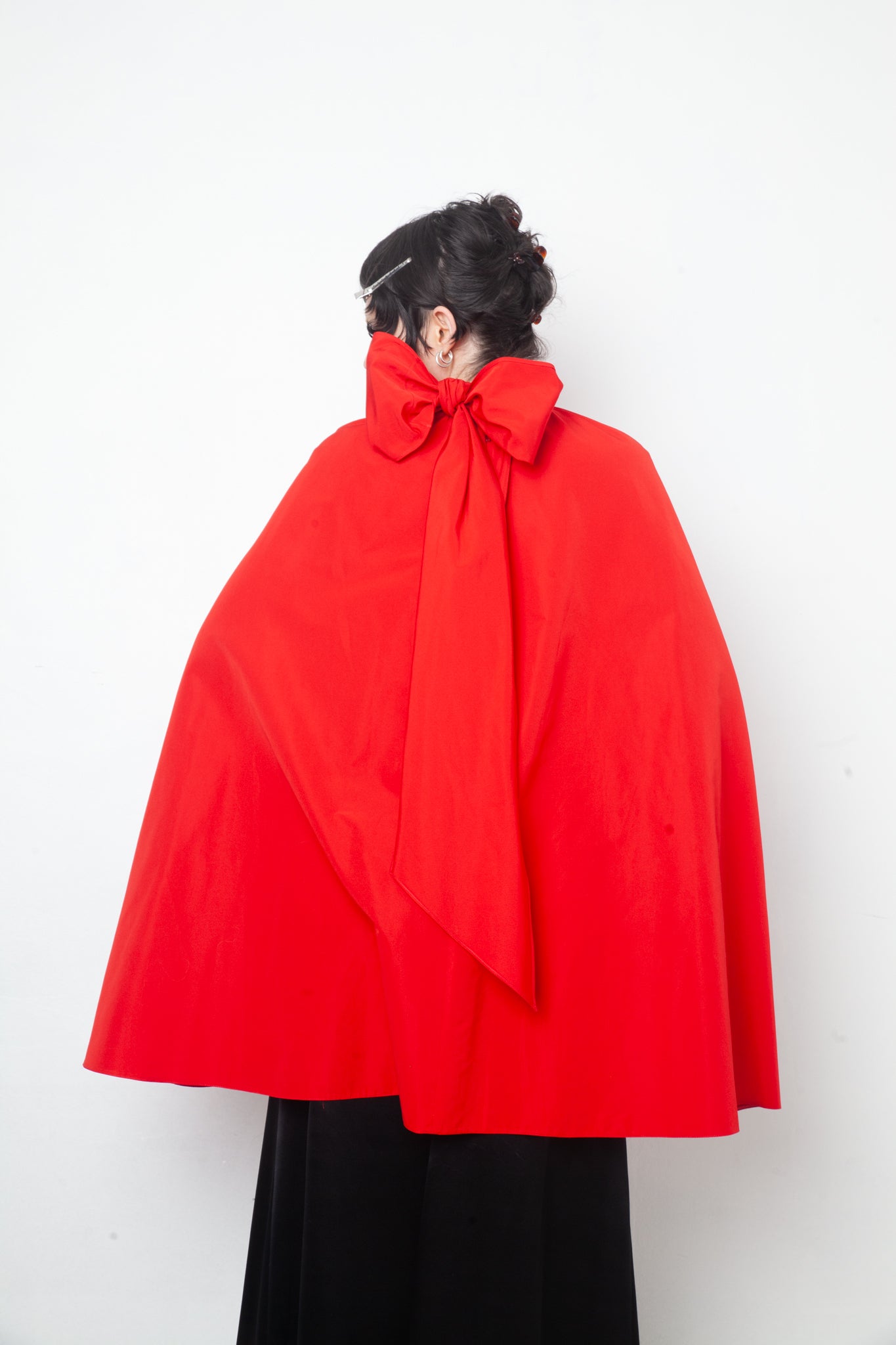 Valentino 2020’s red cape with bow in back