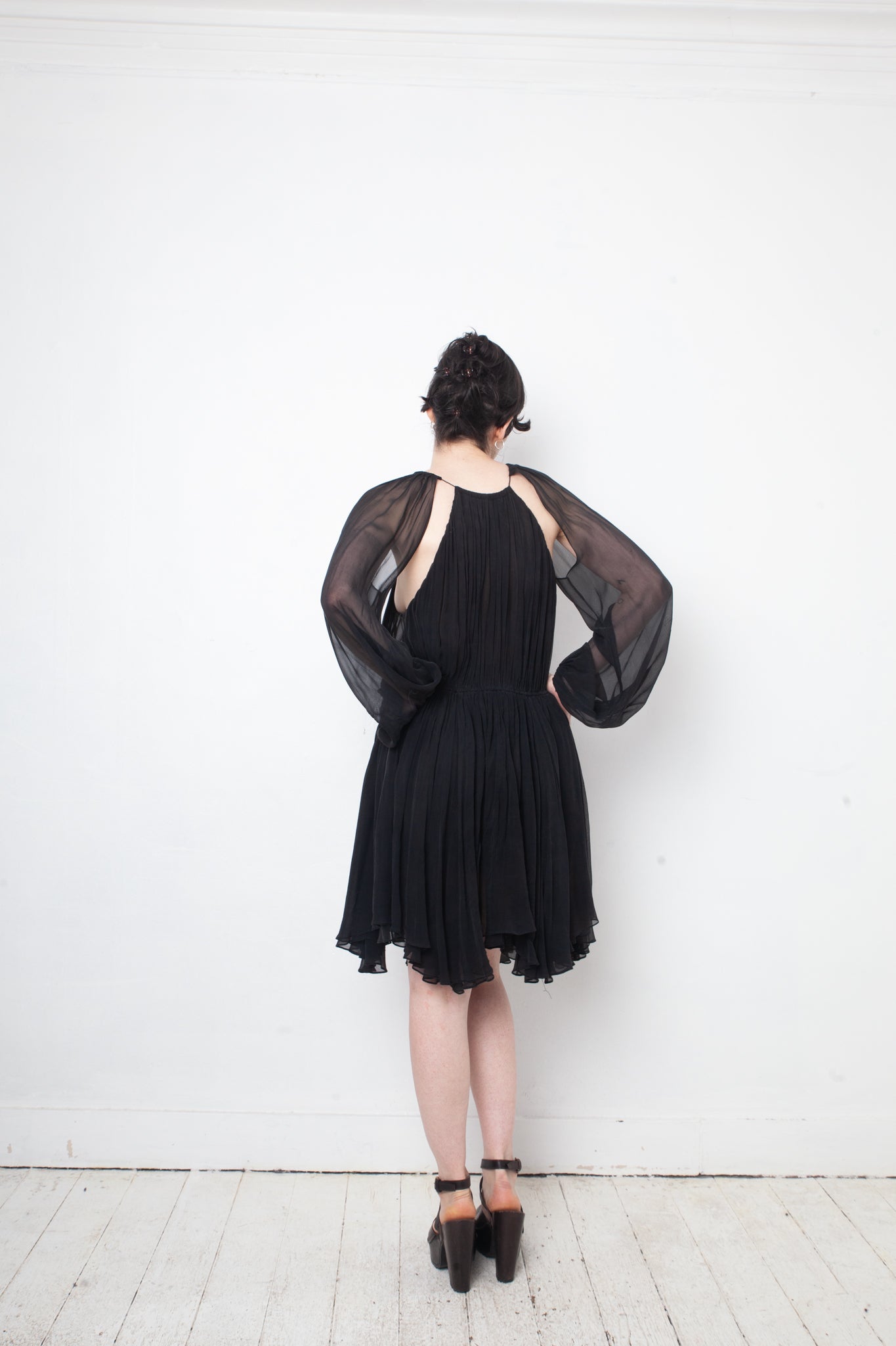 No Label Black silk babydoll pleated dress with sheer balloon sleeves