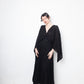 Valentino black heavy knit evening gown with deep V neck and open back