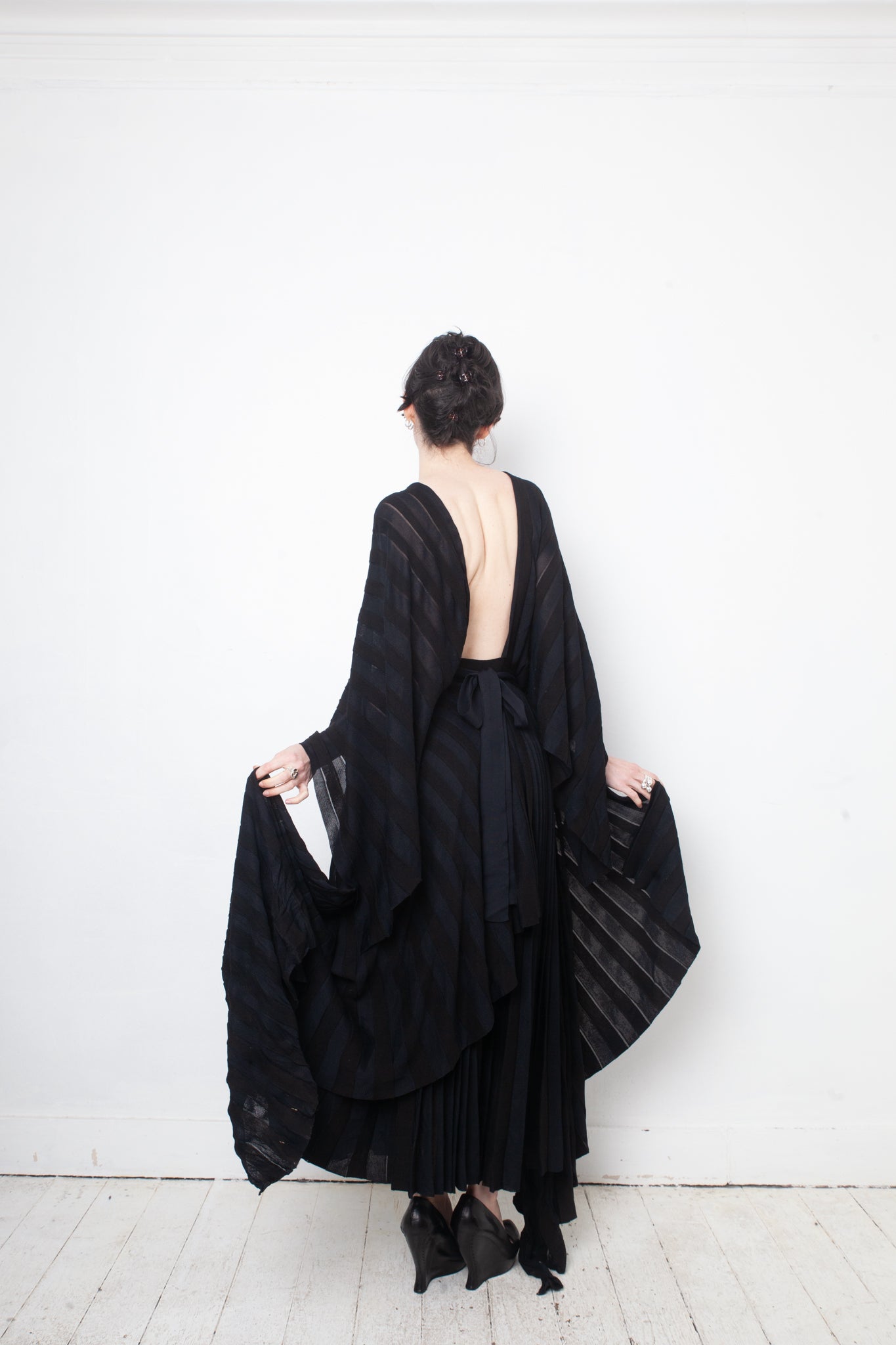 Valentino black heavy knit evening gown with deep V neck and open back