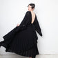 Valentino black heavy knit evening gown with deep V neck and open back
