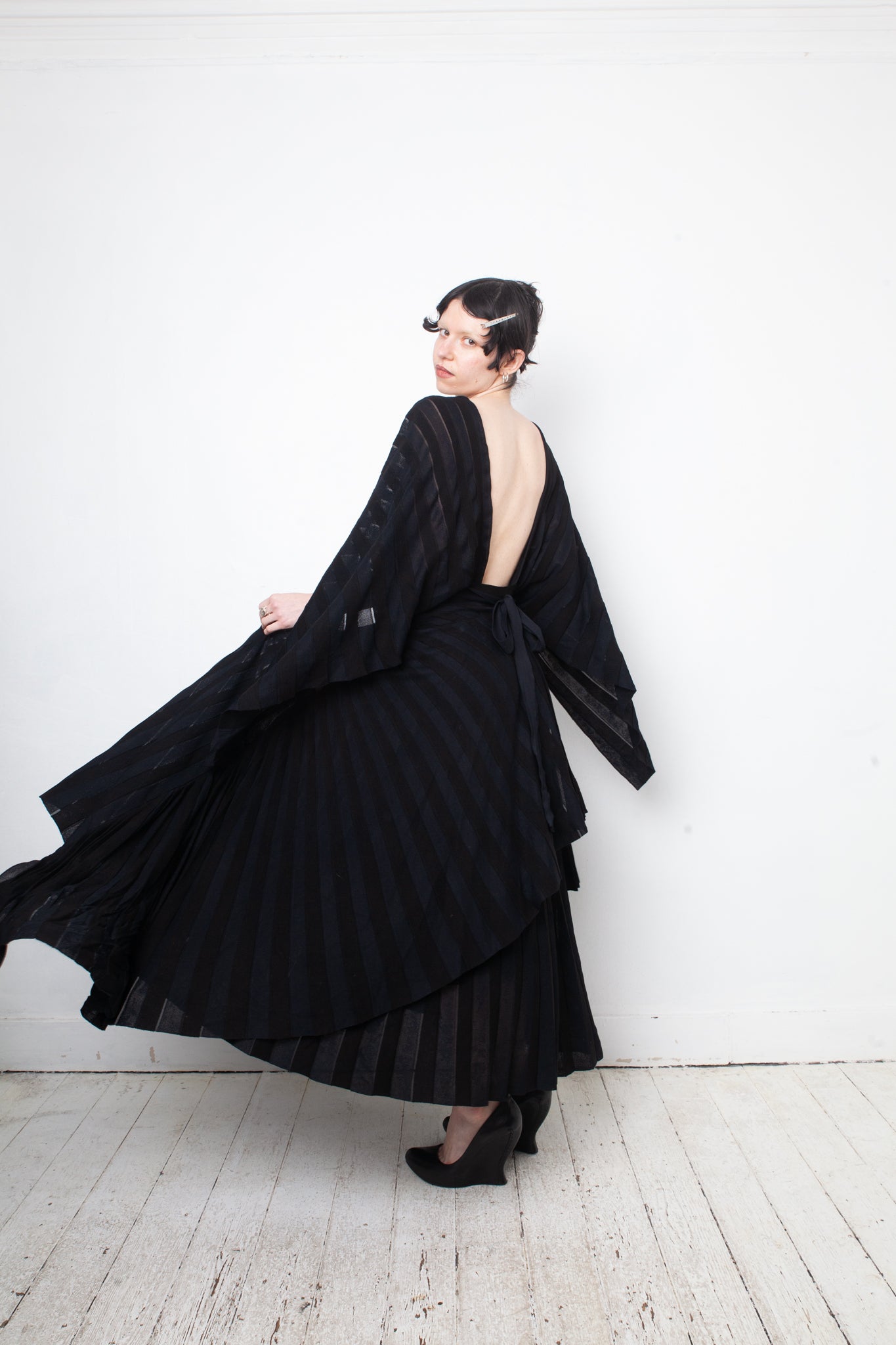 Valentino black heavy knit evening gown with deep V neck and open back