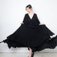 Valentino black heavy knit evening gown with deep V neck and open back