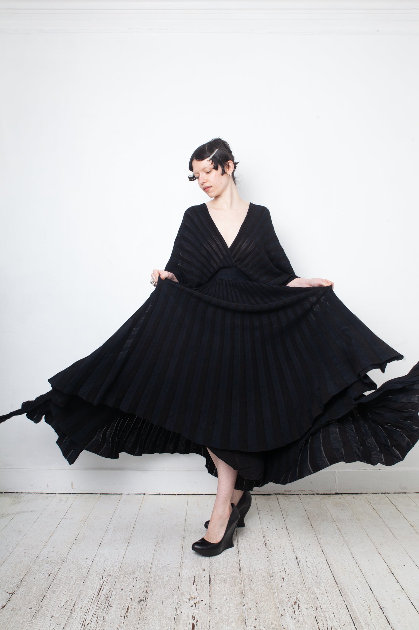 Valentino black heavy knit evening gown with deep V neck and open back