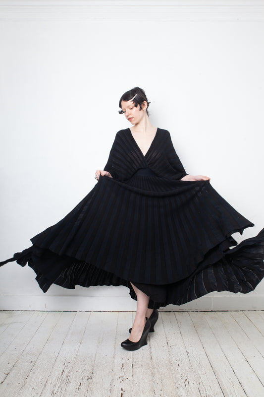 Valentino black heavy knit evening gown with deep V neck and open back