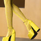 Versace FW 2021 full runway look 36 : yellow dress , Medusa Aevitas heels and stockings