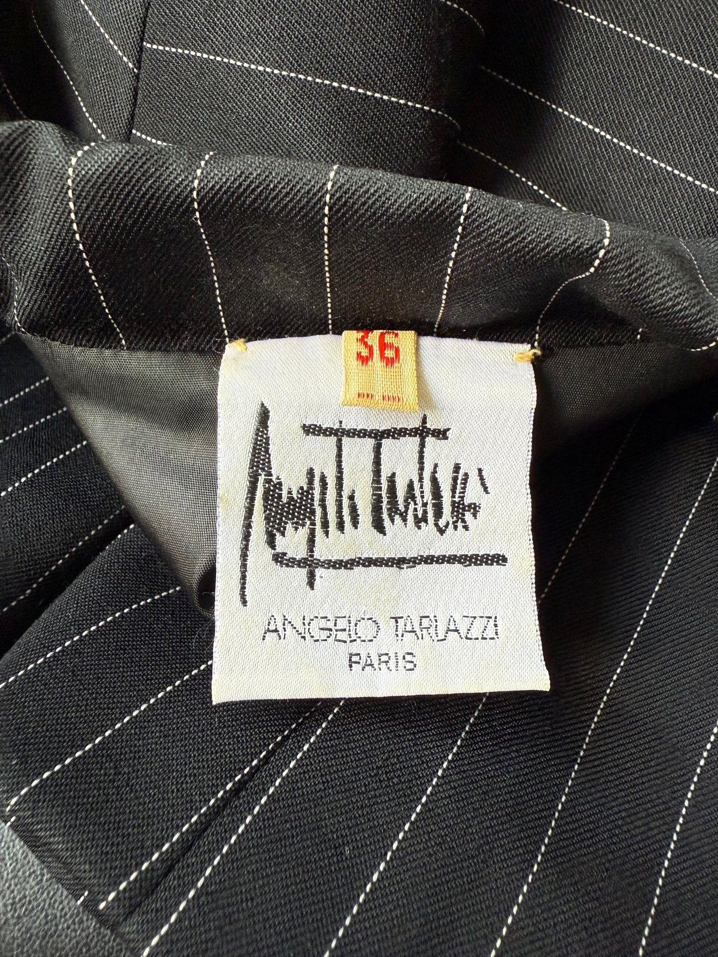 Angelo Tarlazzi 90's pinstripe black skirt suit with red leather waistband