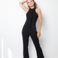 Ter & Bantine 2000's black flared jumpsuit with row of bows
