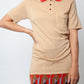 Vintage 1950's Italian beige cotton polo with red collar and buttons