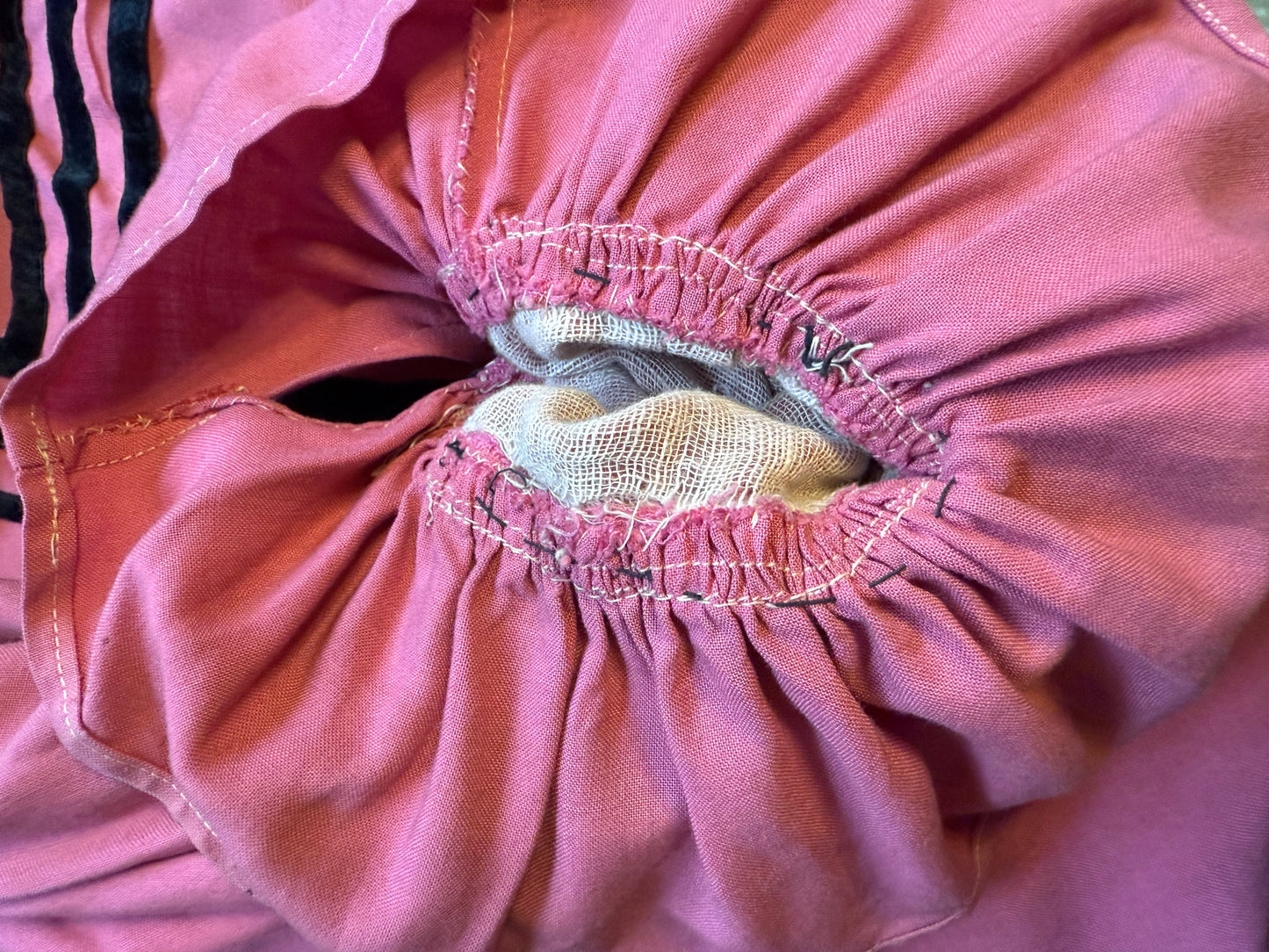 1920's pink theater costume with lace collar and flounce sleeves