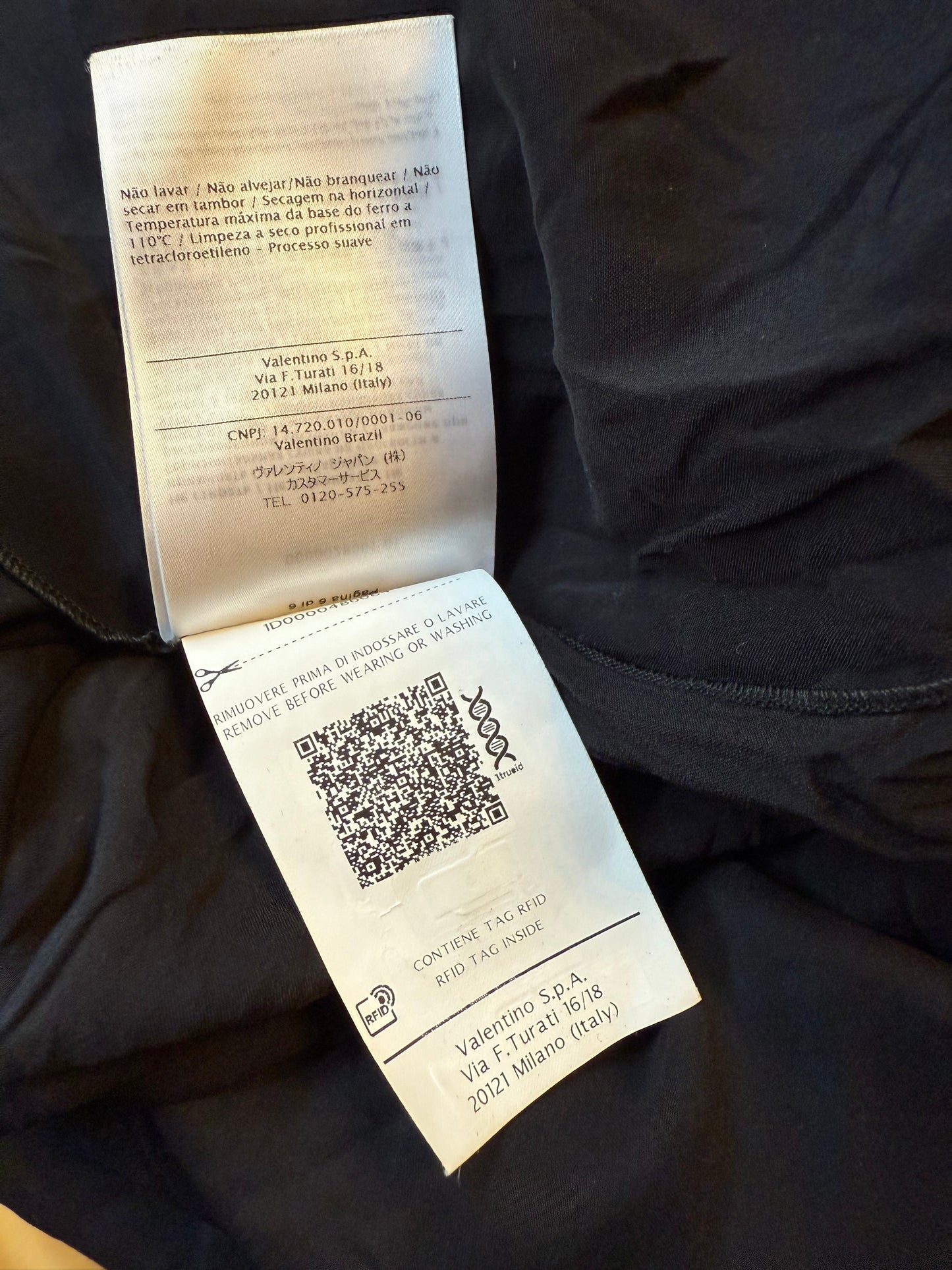 Valentino black heavy knit evening gown with deep V neck and open back