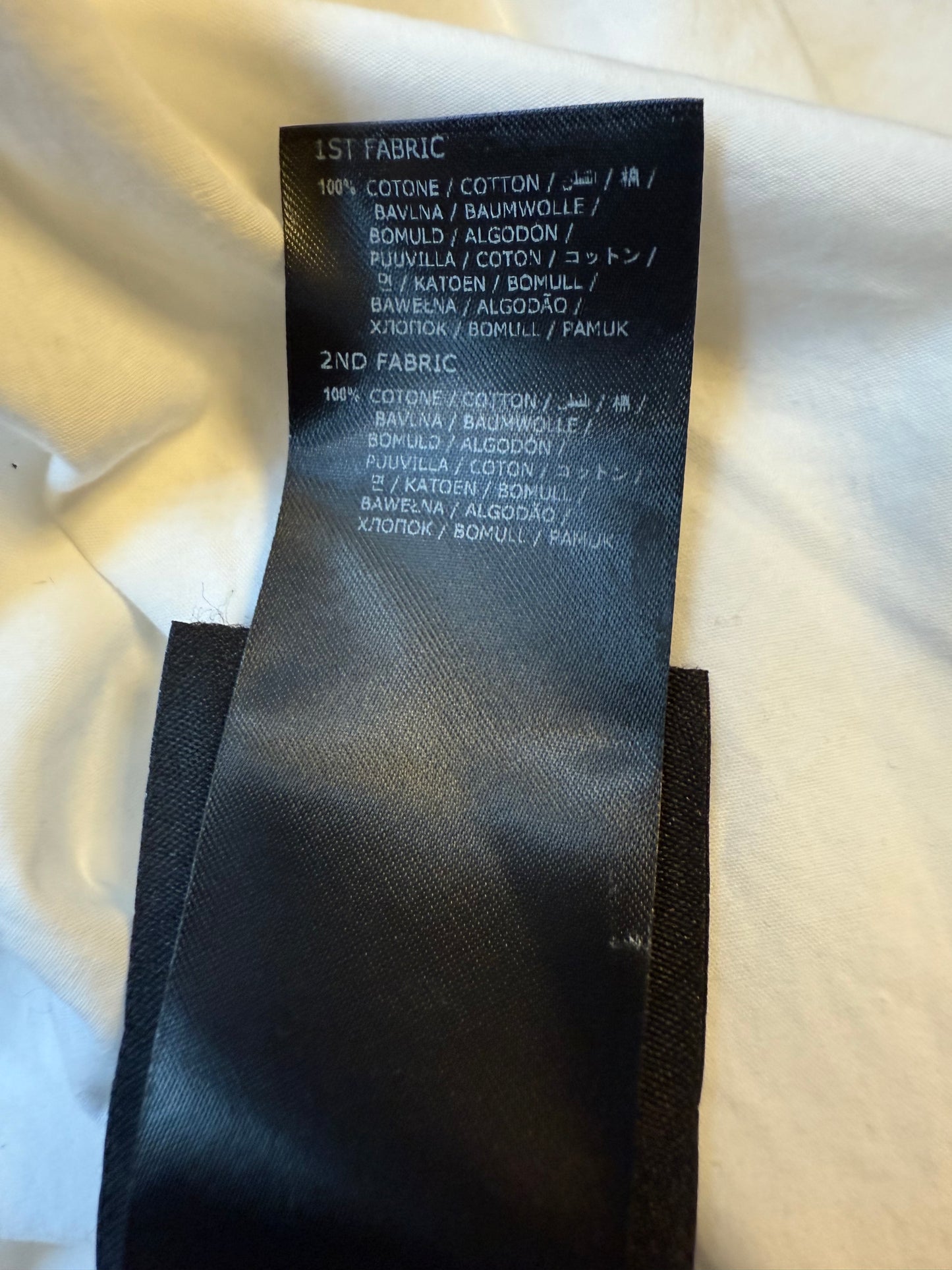 Ann Demeulemeester SS 2022 white denim oversized gilet with back slit and belts