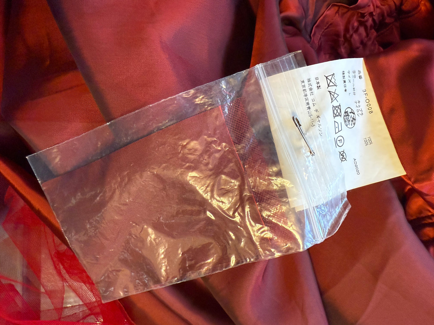 Noir Kei Ninomiya 2020’s red silky tulle A-line dress