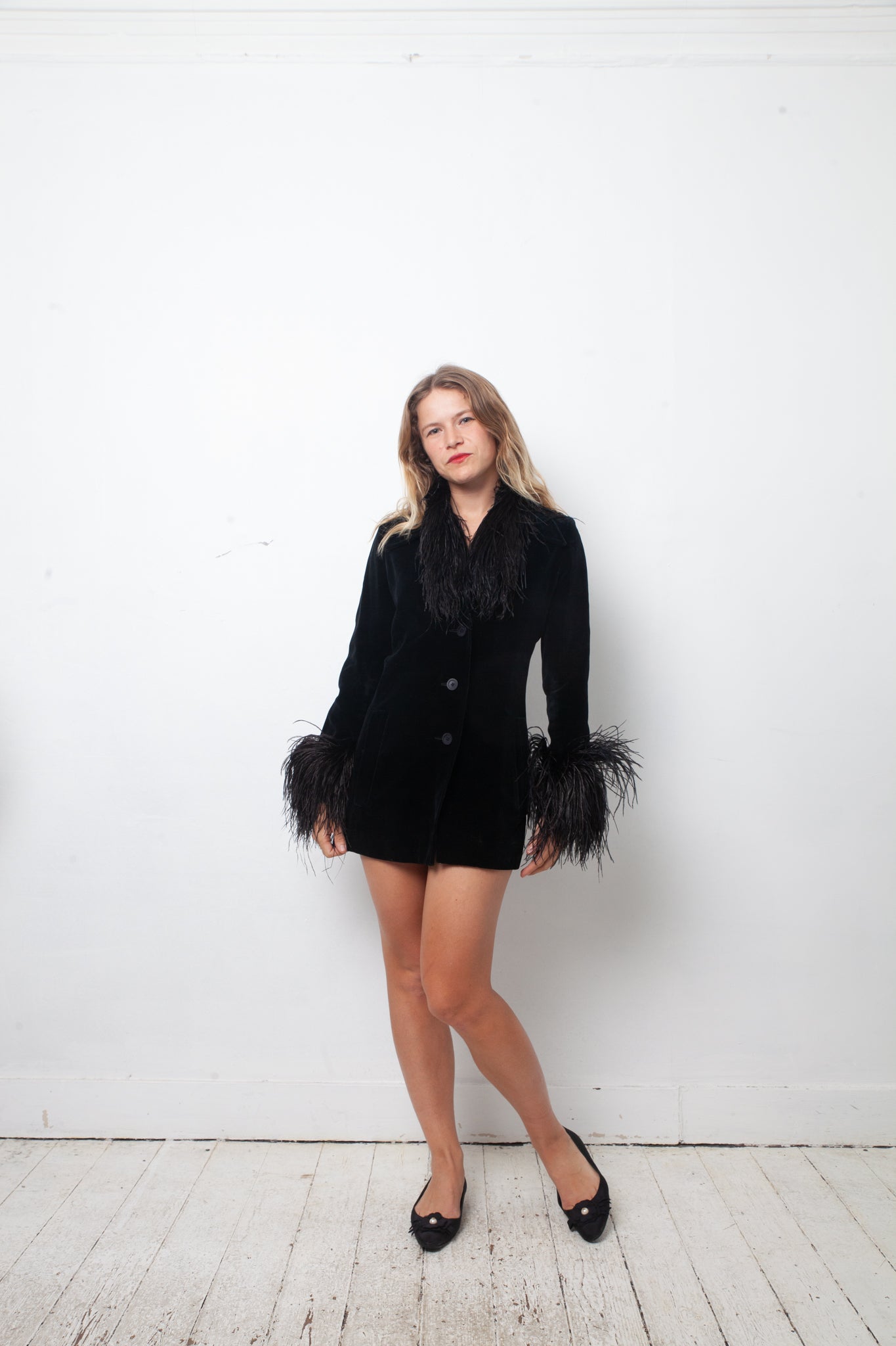 Vintage black velvet jacket with feather collar and cuffs