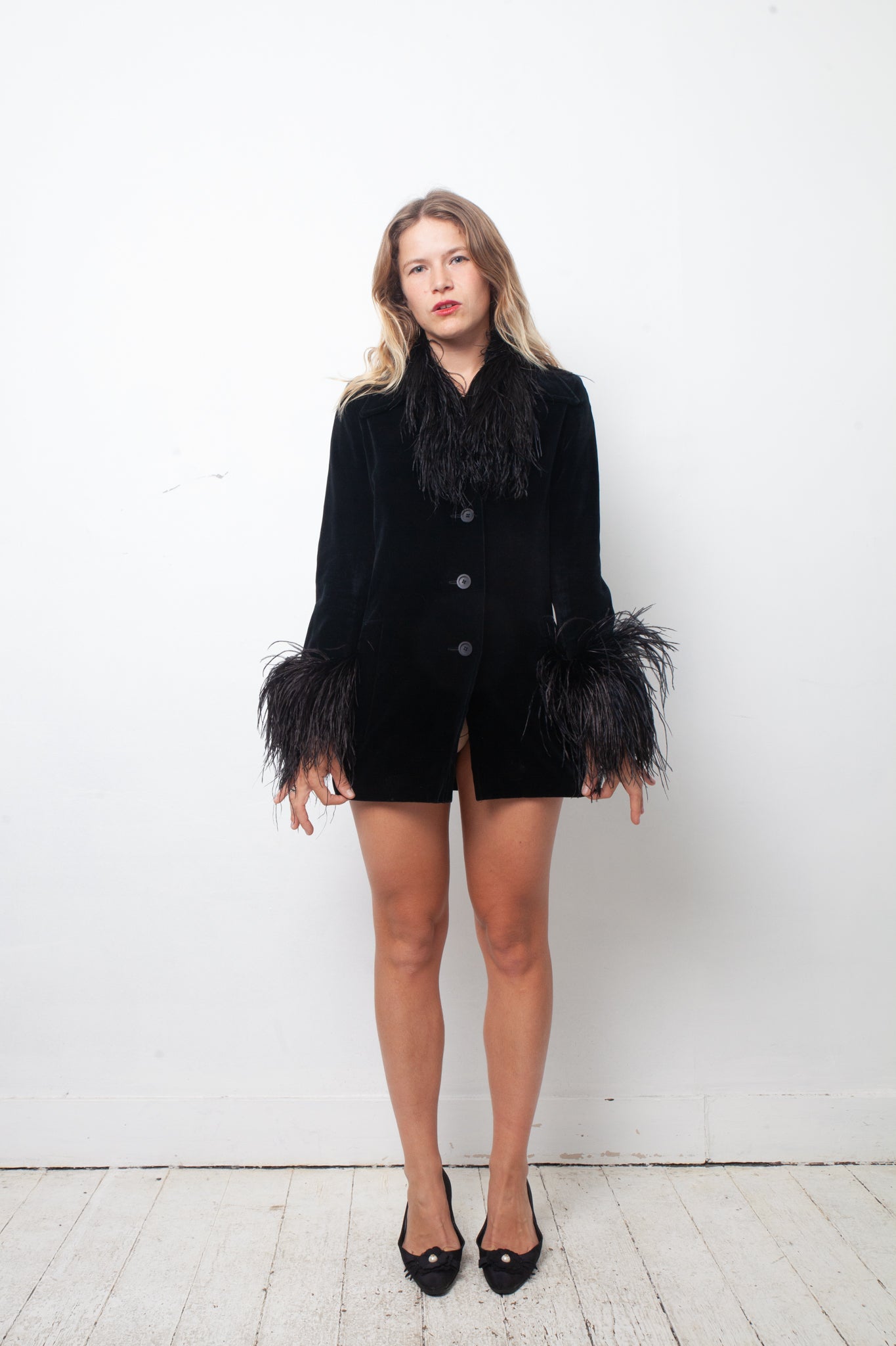 Vintage black velvet jacket with feather collar and cuffs