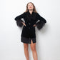 Vintage black velvet jacket with feather collar and cuffs