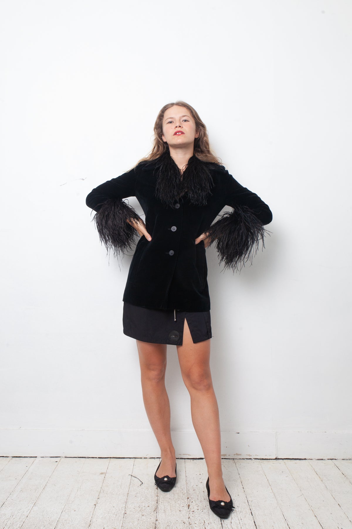 Vintage black velvet jacket with feather collar and cuffs