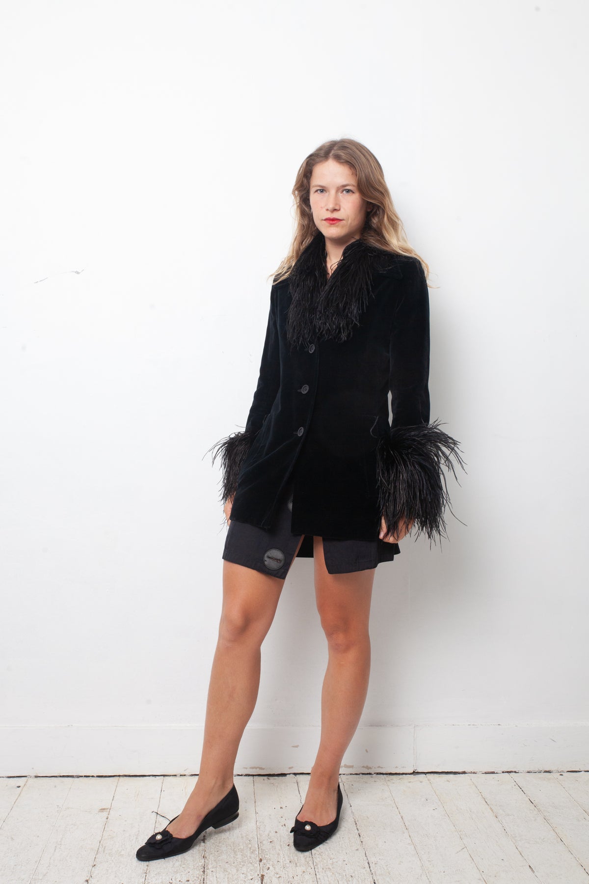 Vintage black velvet jacket with feather collar and cuffs