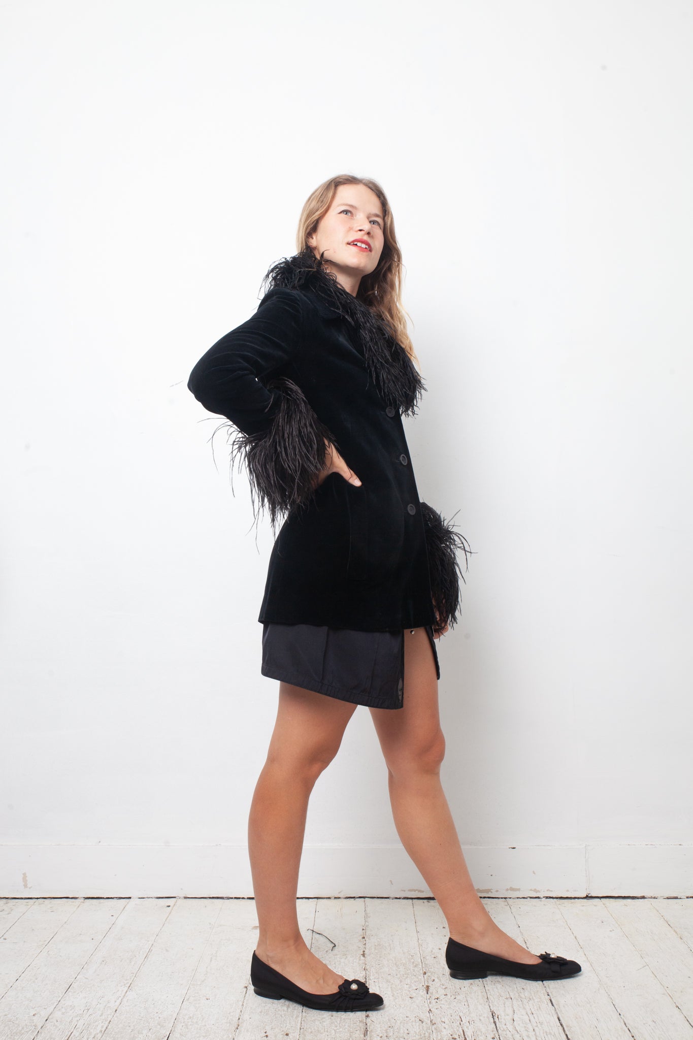 Vintage black velvet jacket with feather collar and cuffs