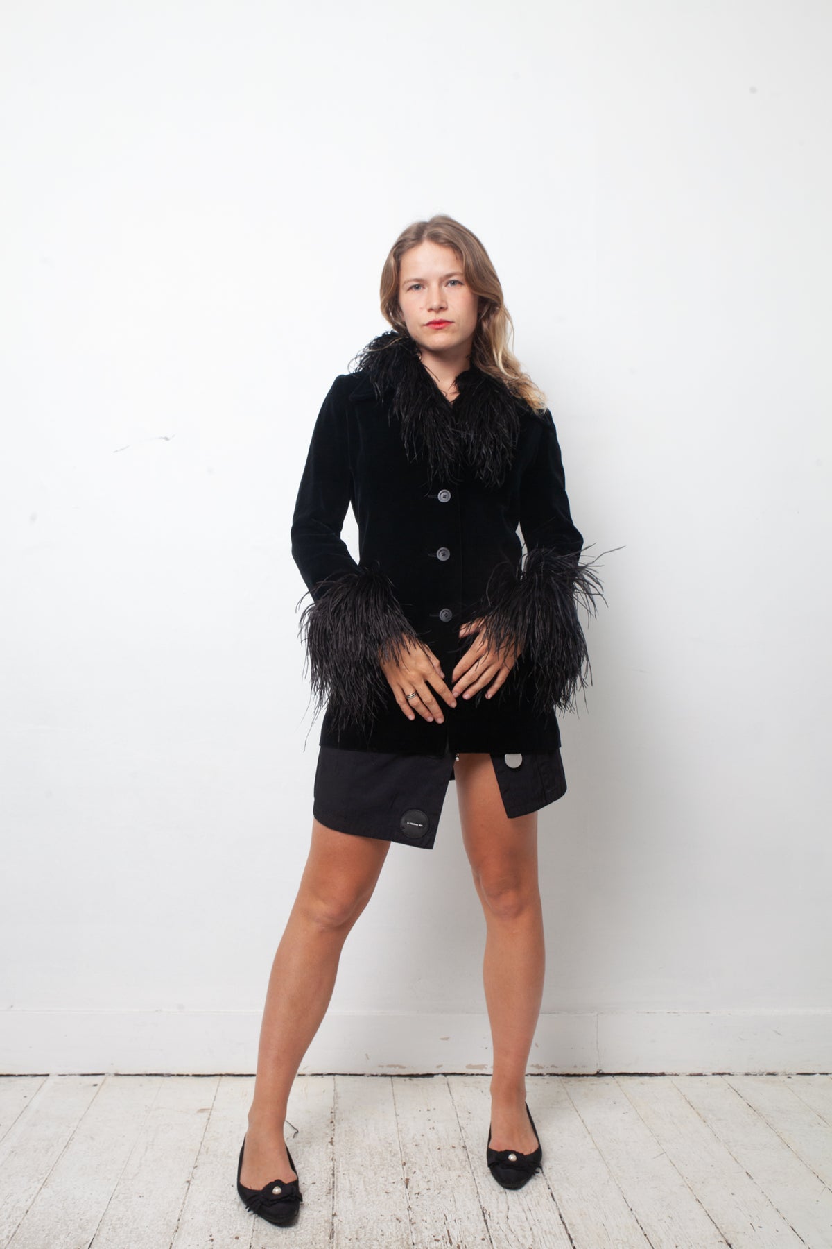 Vintage black velvet jacket with feather collar and cuffs