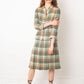 Chanel Haute Couture 1970s green tweed skirt suit with golden turtle buttons.