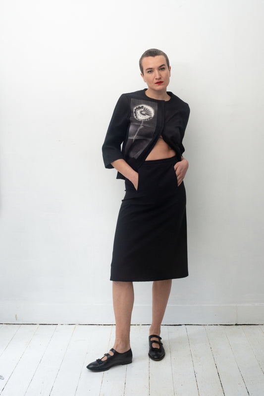 Prada 2000's black nylon midi skirt with velcro front pockets and leather belt detail