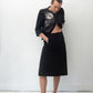 Prada 2000's black nylon midi skirt with velcro front pockets and leather belt detail