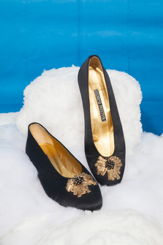 Andrea Pfister black ballerina-like shoes with small heel and golden detail